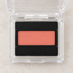 Close detail of Coral Sunrise Mary Kay Mineral Cheek Color refill pan in clear protective clamshell
