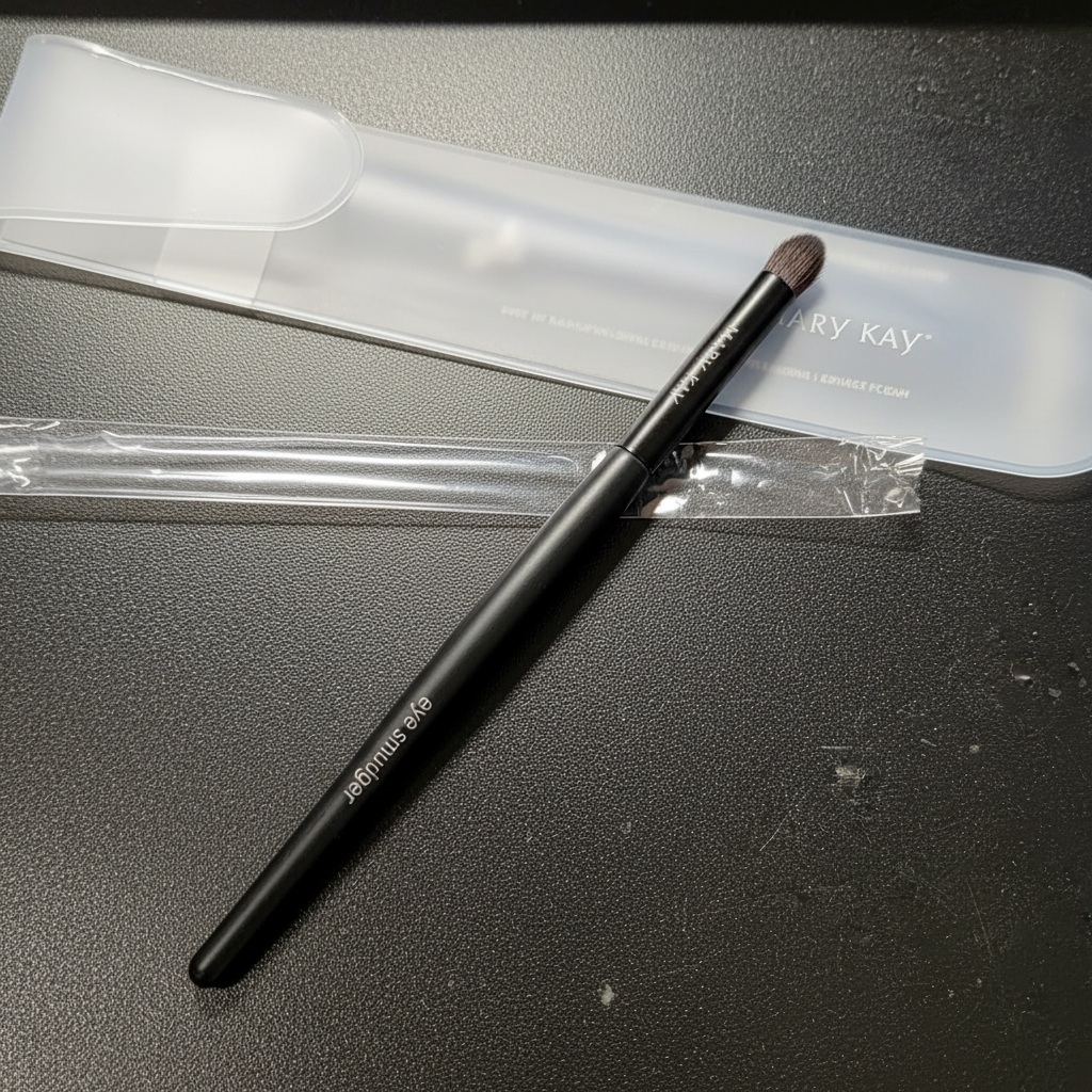 Mary Kay Eye Smudger Brush showing the softly domed bristles and black handle