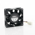 Nidec refrigerator evaporator fan motor staged on a clean professional workstation