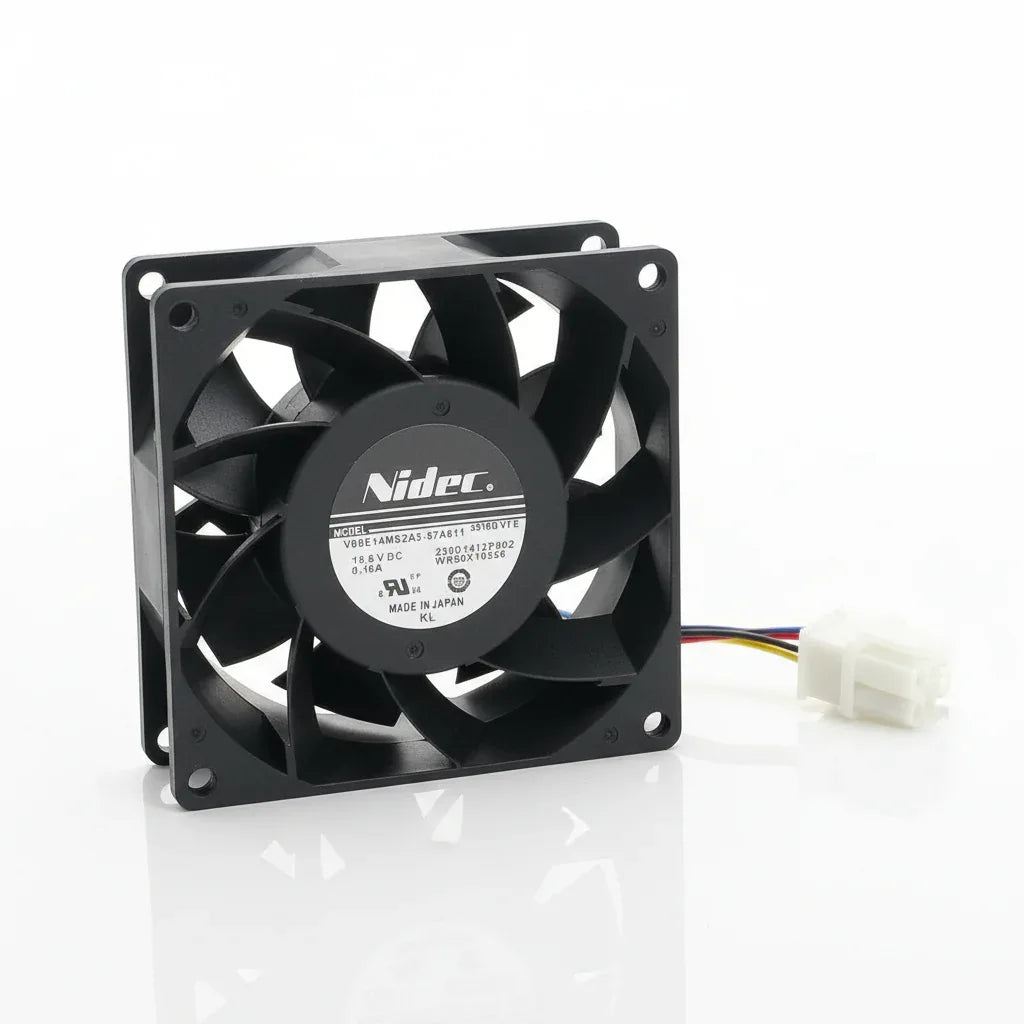 Nidec refrigerator evaporator fan motor staged on a clean professional workstation