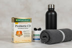 Nature's Bounty Probiotic CD box in gym bag essentials scene shallow depth of field