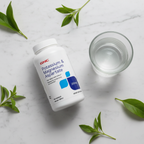 GNC Potassium & Magnesium Aspartate bottle on marble with green leaves and water – More4less Outlet