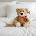 GUND Philbin Teddy Bear displayed as timeless gift on white bedding with kraft paper gift tag - More4less Outlet