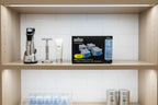 Clean bathroom cabinet organization showcasing high-end razor care accessories