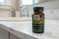 Gaia Herbs Quick Defense 20ct Phyto-Caps on white marble bathroom vanity — premium herbal immune support daily routine