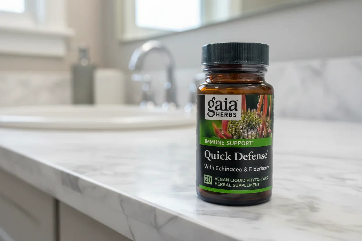 Gaia Herbs Quick Defense 20ct Phyto-Caps on white marble bathroom vanity — premium herbal immune support daily routine