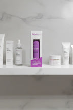 Professional skincare shelf display featuring a purple Timeless Skin Care facial mist spray in minimalist white packaging