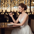 Lifestyle image — elegant woman in white evening dress applying slim perfume wand to wrist at glamorous event, sparkling bokeh background, sophisticated lifestyle for visual context only