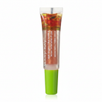 Close-up macro of Mary Kay Dual Lip Glaze Warm Coral — clear dual-chamber squeeze tube with green cap showing metallic coral-gold shimmer pigment core separated from clear gloss outer chamber on a white background