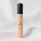 Slim peach skincare serum tube black cap soft white background minimalist luxury beauty product vitamin C serum detail shot - More4less Outlet