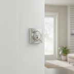 Kwikset Signature Series square polished chrome deadbolt lock installed on modern white front door – More4less Outlet