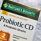 Macro close-up of Nature's Bounty Probiotic CD box texture on minimalist marble surface