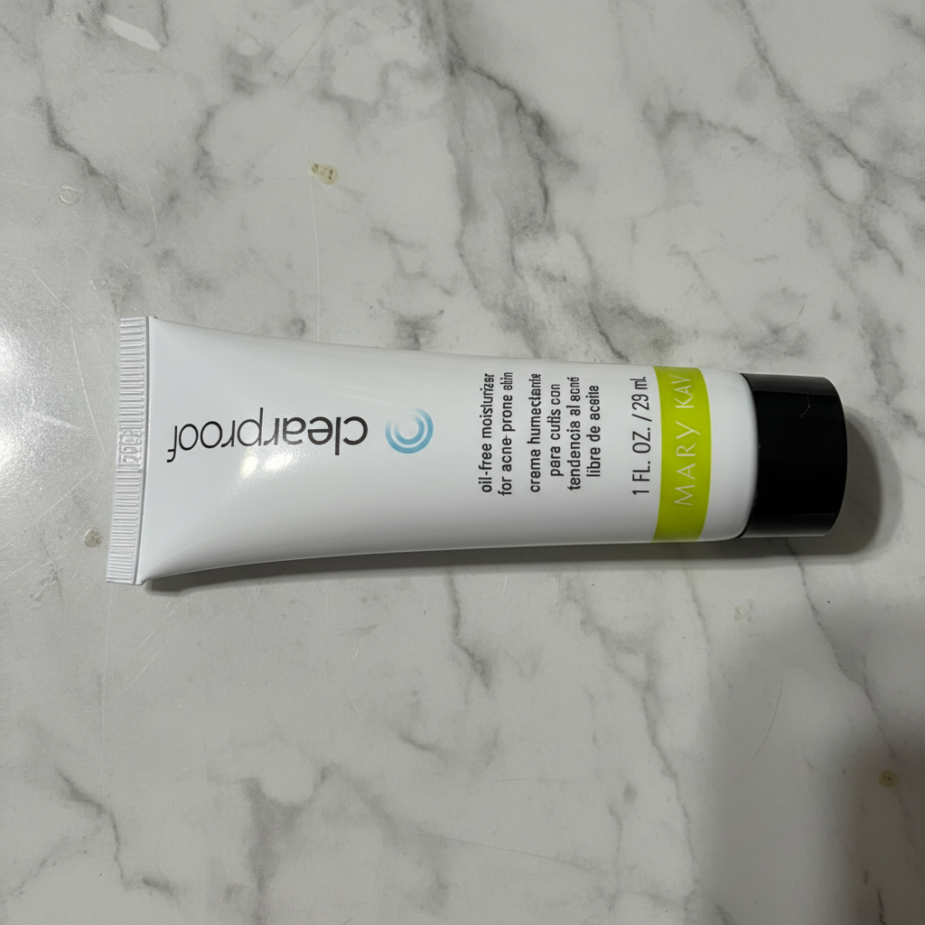 Close-up of Mary Kay Clear Proof moisturizer tube front label showing clearproof branding and 1 FL. OZ.