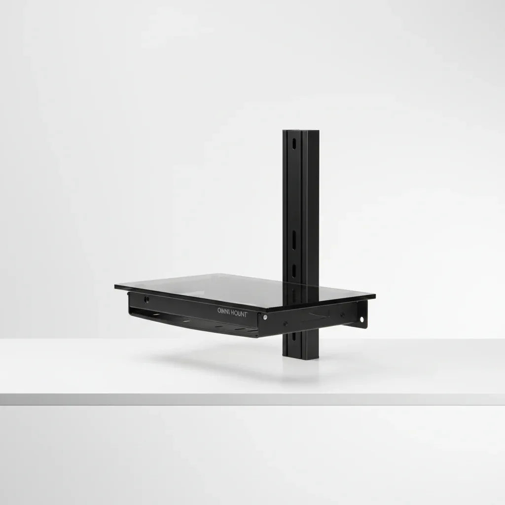OmniMount OWS22 AV wall shelf studio tabletop shot highlighting black finish and mounting hardware