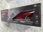 Boxed Mongoose scooter with visible branding and product details on a textured surface