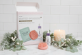SpaLife Winter Wonders 3-piece hair care gift set open on bathroom vanity with hair mask serum massager winter greenery and candle – More4less Outlet