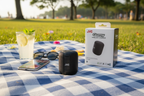 JVC Gumy SP-SG1BT wireless Bluetooth speaker black on outdoor picnic blanket with phone sunglasses and cold drink – More4less Outlet