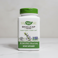 Nature's Way Skullcap Herb 850 mg bottle on a clean white counter