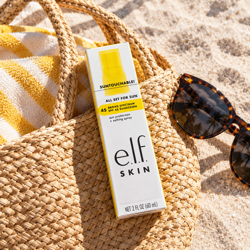 e.l.f. SKIN Suntouchable All Set For Sun SPF 45 box with a beach bag and sunglasses