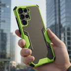 Lifestyle shot of Samsung Galaxy S22 Ultra with neon green and black rugged case installed showing camera cutout alignment