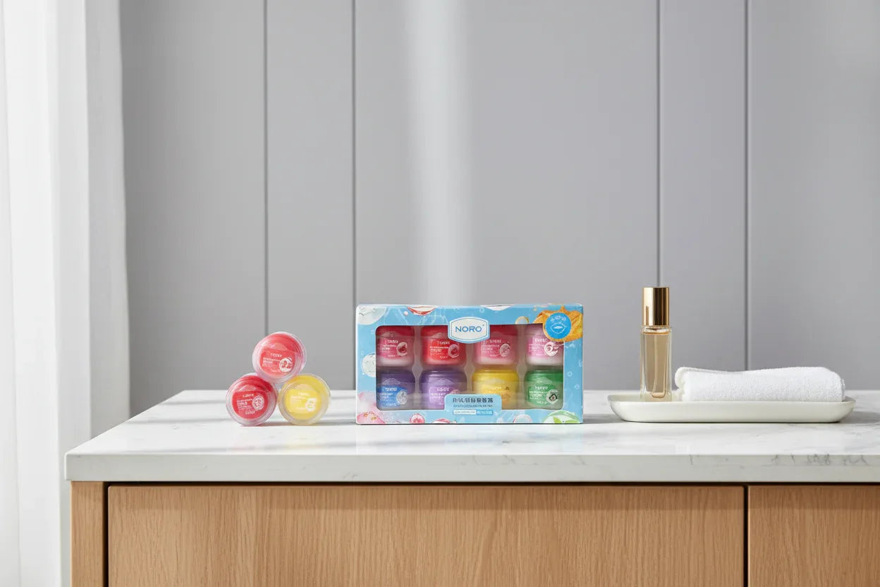 Noro Hydrating Lip Balm Set on modern minimalist vanity table with neatly arranged colorful lip balm jars
