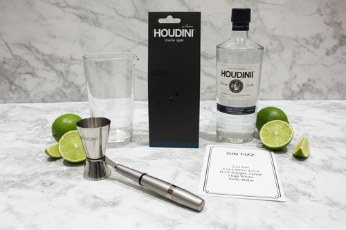 Houdini Double Jigger on white marble with gin bottle lime wedges and cocktail recipe card - More4less Outlet