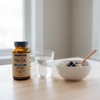 AI-generated contextual image of Wiley's Finest Peak EPA Wild Alaskan Fish Oil 60 Softgels beside water and a breakfast bowl