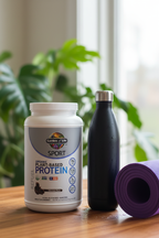 Garden of Life Sport Organic Plant Protein tub on wooden surface with yoga mat water bottle and green plants