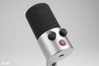JLab GO Talk USB Microphone close-up showing volume knob, mute button with LED indicator, and USB-C port — More4less Outlet