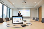 Belkin USB-C to VGA adapter connecting laptop to VGA projector in conference room or classroom — More4less Outlet