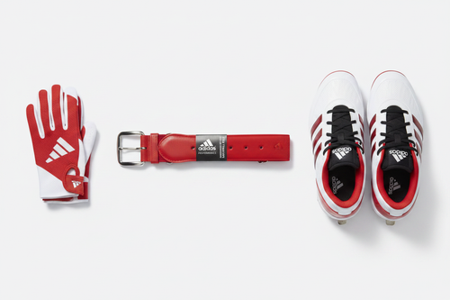 Adidas Performance red elastic baseball belt flat lay with baseball cleats and batting gloves – More4less Outlet