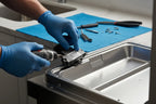 Replacing a broken dishwasher door latch with a new OEM part