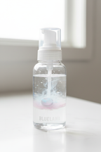Blueland soap tablet dissolving in clear designer foaming soap bottle