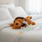 Ebba Baby Lion Plush displayed as baby shower gift on white bedding with pastel ribbon - More4less Outlet