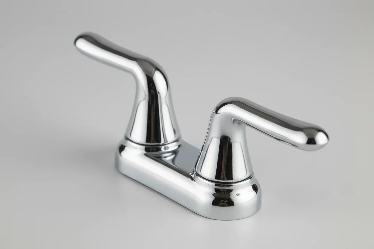 Macro studio shot of smooth reflective chrome finish on American Standard Cadet faucet lever handles