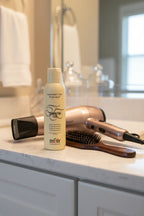 Itely Hairfashion Thermoactive Fluid on quartz bathroom vanity with ionic blow dryer and professional hairbrush — More4less Outlet