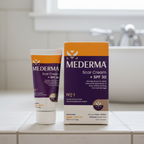 Mederma Scar Cream SPF 30 0.7 oz tube and box on a bathroom shelf