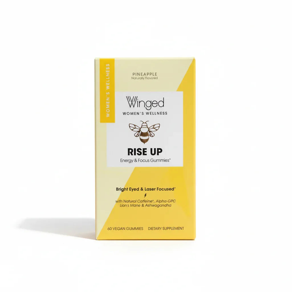 Winged Rise Up gummies yellow box on high-key white studio background lifestyle image