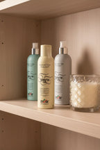 Itely Hairfashion Thermoactive Fluid on beauty shelf with salon-style bottles and decorative glass candle — More4less Outlet