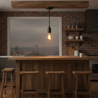 Feit Electric vintage industrial pendant light hanging over rustic kitchen island
