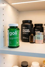 Goli Supergreens Gummies jar in organized white wood pantry shelf with health supplement containers — More4less Outlet