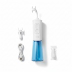 Flat lay overhead of the Miracle Smile Water Flosser unit, H-shaped flossing head, USB charging cord, and replaceable tip on a white background.