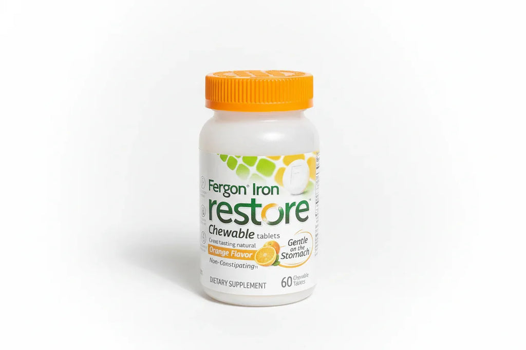 Fergon Iron Restore dietary supplement bottle on bright studio backdrop