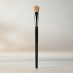 Mary Kay Cream Eye Color and Concealer Brush upright against a neutral background