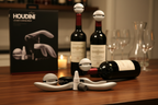 Houdini Lever Corkscrew full 5-piece kit flatlay on rustic wood table with open wine bottles, silver ball stoppers in use, foil cutter and retail box - More4less Outlet