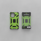 Overhead flat-lay of neon green and black S22 Ultra phone case beside original clear retail packaging on gray surface