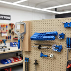 Kreg Pocket-Hole Jig 320 displayed on organized tool pegboard inside well-lit professional modern workshop