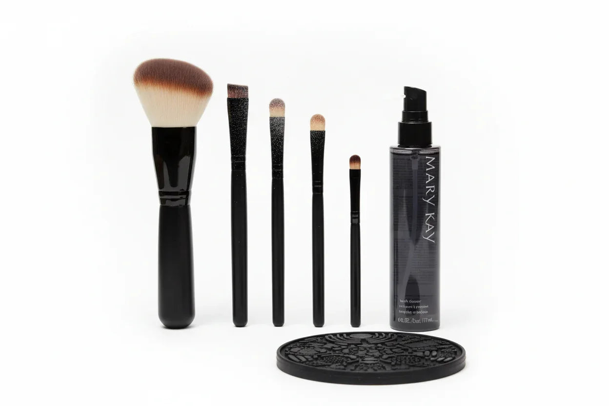 Studio high-key shot of cosmetic brush maintenance equipment with professional makeup brushes and spray cleaner