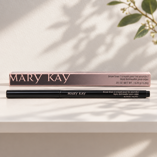 Mary Kay Brow Liner Blonde pencil and retail box on a pale shelf in morning light