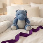 Russ Jazwares 17 inch Blue Dragon Dinosaur Plush displayed as gift on white bedding with ribbon - More4less Outlet